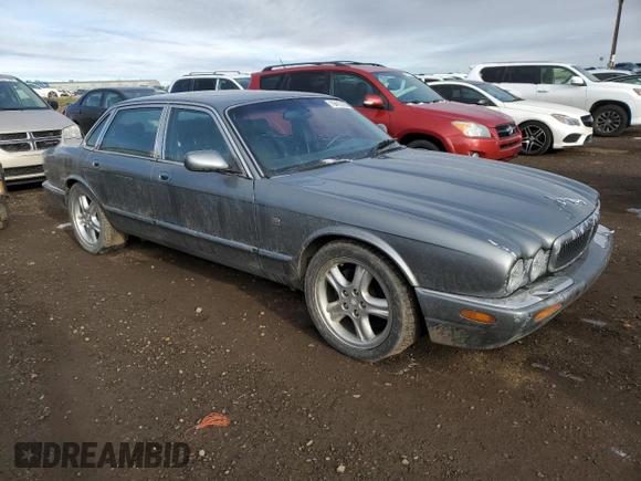 2002 Jaguar XJ with VIN SAJFA12C72LF47096, listed as a Copart auction lot 79412794 with 287,060 mi miles and Clean Title. Bid and sale history available at DreamBid. Image 4.