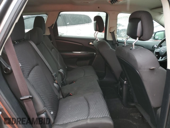2017 Dodge Journey SXT z VIN 3C4PDCBG4HT514494, wystawiony jako Copart lot #55335735 z przebiegiem 101 670 mil mil oraz Szkoda całkowita • Salvage title. Historia ofert i sprzedaży dostępna na DreamBid. Obrazek 11.