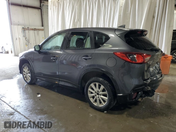 2016 Mazda CX-5 Touring with VIN JM3KE4CY3G0716346, listed as a Copart auction lot 51467895 with 133,218 mi miles and Salvage Title. Bid and sale history available at carsss.com. Image 2.