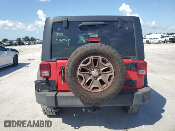 2014 Jeep Wrangler Unlimited Rubicon with VIN 1C4HJWFG5EL162736, listed as a Copart auction lot 64077645 with 126,330 mi miles and Salvage title. Bid and sale history available at DreamBid. Image 6.