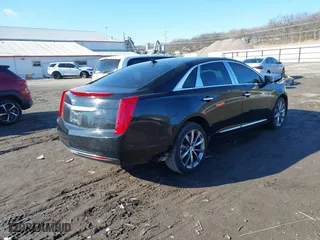 2013 Cadillac XTS with VIN 2G61N5S38D9117544, listed as a IAAI auction lot 41681172 with 189,664 mi miles. Bid and sale history available at carsss.com. Image 4.
