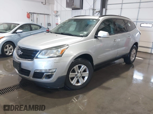 2013 Chevrolet Traverse LT with VIN 1GNKVGKDXDJ219140, listed as a IAAI auction lot 41702625 with 223,440 mi miles and . Bid and sale history available at DreamBid. Image 2.
