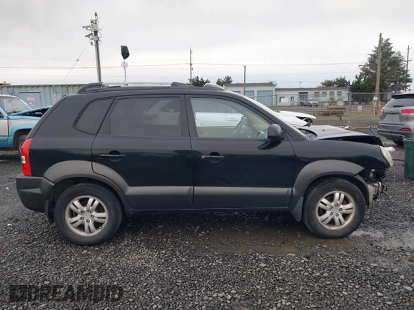 2006 Hyundai Tucson GLS with VIN KM8JN72D66U338658, listed as a IAAI auction lot 41828712 with 198,185 mi miles. Bid and sale history available at carsss.com. Image 14.