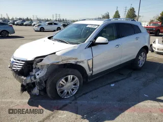 2015 Cadillac SRX Luxury Collection with VIN 3GYFNBE34FS555989, listed as a Copart auction lot 52765485 with 93,988 mi miles and Salvage Title. Bid and sale history available at DreamBid. Image 1.