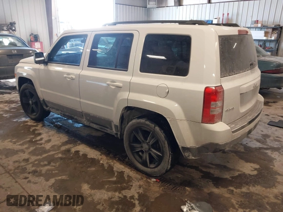 2014 Jeep Patriot Latitude with VIN 1C4NJRFB4ED864114, listed as a IAAI auction lot 41639732 with 103,119 mi miles. Bid and sale history available at carsss.com. Image 3.
