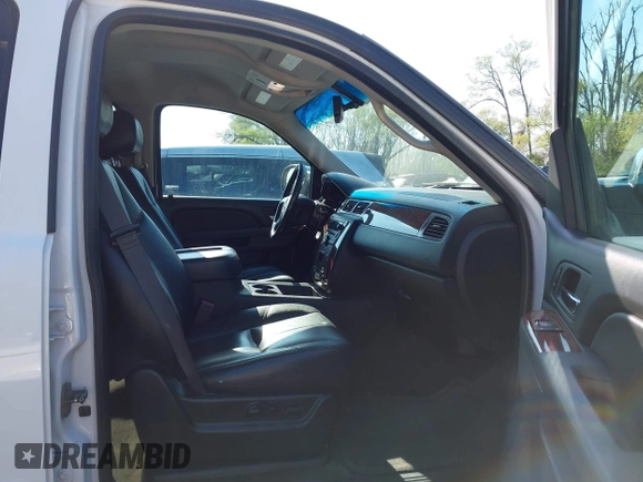 2013 Chevrolet Suburban LT with VIN 1GNSKJE75DR174167, listed as a IAAI auction lot 42005614 with 290,223 mi miles and . Bid and sale history available at DreamBid. Image 5.