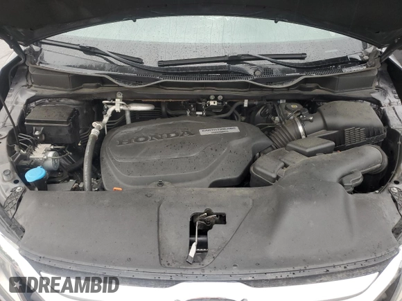 2018 Honda Odyssey EX with VIN 5FNRL6H50JB047999, listed as a Copart auction lot 57819495 with 121,295 mi miles and Salvage title. Bid and sale history available at DreamBid. Image 12.