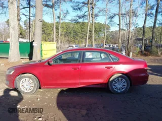 2015 Volkswagen Passat 1.8T Limited Edition with VIN 1VWAT7A33FC007414, listed as a IAAI auction lot 41305891 with 81,440 mi miles. Bid and sale history available at carsss.com. Image 14.