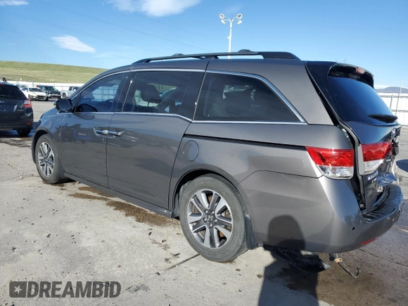 2015 Honda Odyssey Touring Elite with VIN 5FNRL5H94FB037299, listed as a Copart auction lot 53886345 with 109,032 mi miles and Salvage Title. Bid and sale history available at DreamBid. Image 2.