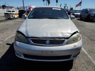 2006 Suzuki Reno z VIN KL5JD66Z36K455929, wystawiony jako Copart lot #49444974 z przebiegiem Nie podano mil oraz Szkody całkowita. Historia ofert i sprzedaży dostępna na DreamBid. Obrazek 5.