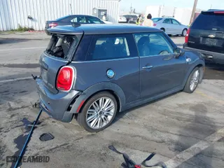 2015 MINI Cooper Hardtop S with VIN WMWXP7C59F2A60317, listed as a IAAI auction lot 41703020 with NaN miles. Bid and sale history available at carsss.com. Image 4.