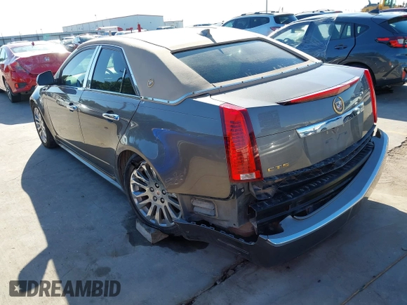 2012 Cadillac CTS Luxury z VIN 1G6DF5E58C0142041, wystawiony jako IAAI lot #42235864 z przebiegiem 59 697 mil mil oraz . Historia ofert i sprzedaży dostępna na DreamBid. Obrazek 6.