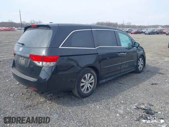 2017 Honda Odyssey EX-L with VIN 5FNRL5H65HB026014, listed as a IAAI auction lot 41719790 with 61,429 mi miles and . Bid and sale history available at DreamBid. Image 4.