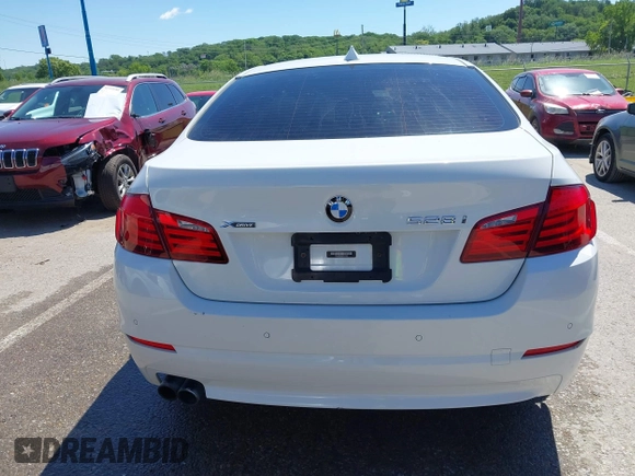2013 BMW 5 Series 528i xDrive with VIN WBAXH5C5XDDW16893, listed as a IAAI auction lot 42316961 with 173,300 mi miles and . Bid and sale history available at DreamBid. Image 16.