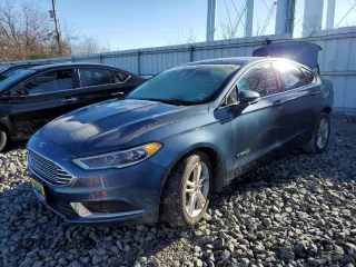 2018 Ford Fusion Hybrid SE with VIN 3FA6P0LU0JR152209, listed as a Copart auction lot 68148722 with 66,729 mi miles. Bid and sale history available at carsss.com. Image 1.