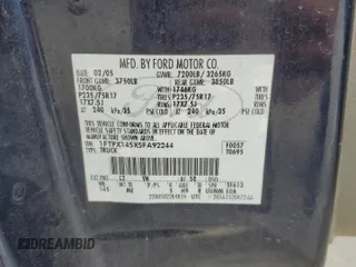 2005 Ford F-150 XLT with VIN 1FTPX145X5FA92244, listed as a Copart auction lot 61569865 with 184,219 mi miles and Salvage title. Bid and sale history available at DreamBid. Image 12.