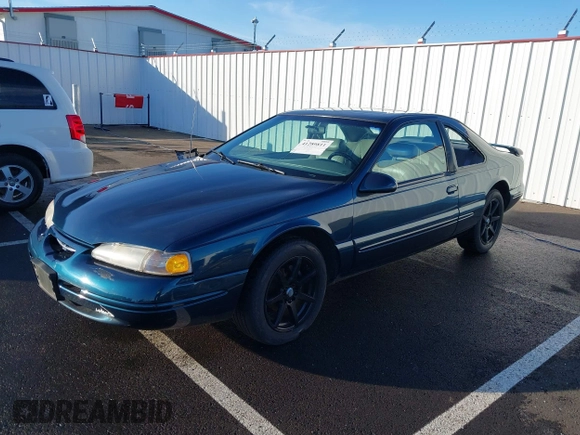 1996 Ford Thunderbird LX z VIN 1FALP62W1TH100925, wystawiony jako IAAI lot #41289811 z przebiegiem 84 056 mil mil oraz . Historia ofert i sprzedaży dostępna na DreamBid. Obrazek 18.