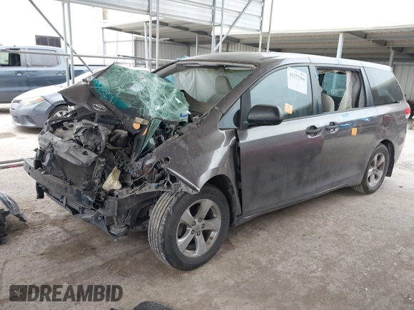 2014 Toyota Sienna L with VIN 5TDZK3DC5ES475204, listed as a IAAI auction lot 41277584 with 125,735 mi miles. Bid and sale history available at carsss.com. Image 2.