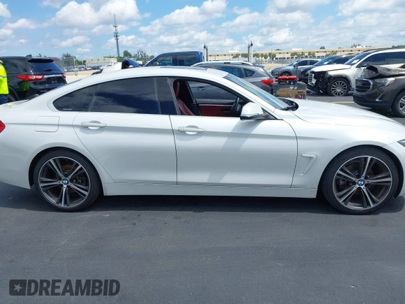 2018 BMW 4 Series 430i with VIN WBA4J1C5XJBG78451, listed as a IAAI auction lot 42256036 with 103,289 mi miles and . Bid and sale history available at DreamBid. Image 14.