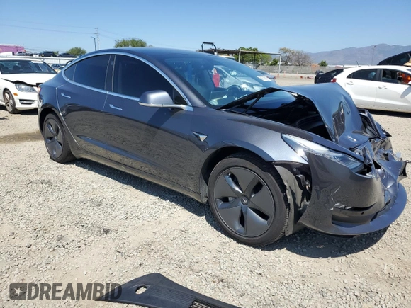 2019 Tesla Model 3 Mid Range with VIN 5YJ3E1EA2KF416304, listed as a Copart auction lot 52792845 with 140,552 mi miles and Salvage Title. Bid and sale history available at DreamBid. Image 4.