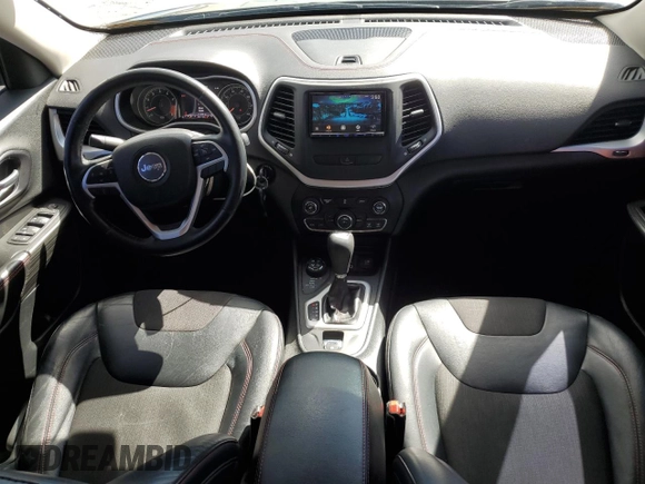 2014 Jeep Cherokee Trailhawk z VIN 1C4PJMBS1EW239692, wystawiony jako Copart lot #57153065 z przebiegiem 111 899 mil mil oraz Szkoda całkowita • Salvage title. Historia ofert i sprzedaży dostępna na DreamBid. Obrazek 8.