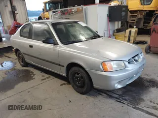 2000 Hyundai Accent z VIN KMHCF35G6YU016772, wystawiony jako IAAI lot #41067014 z przebiegiem 221 560 mil mil oraz . Historia ofert i sprzedaży dostępna na DreamBid. Obrazek 1.