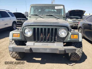 1998 Jeep Wrangler Sport with VIN 1J4FY19S2WP790179, listed as a Copart auction lot 69853294 with 148,675 mi miles and Salvage Title. Bid and sale history available at carsss.com. Image 5.