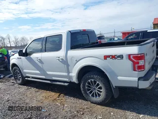 2018 Ford F-150 XL with VIN 1FTEW1E5XJFE20779, listed as a IAAI auction lot 41705616 with 138,996 mi miles and . Bid and sale history available at DreamBid. Image 14.