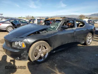 2009 Dodge Charger R/T with VIN 2B3LA53T99H553074, listed as a Copart auction lot 87439734 with 0 mi miles and Salvage Title. Bid and sale history available at carsss.com. Image 1.