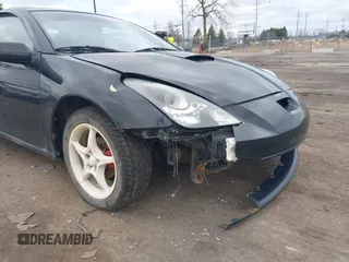 2000 Toyota Celica GT with VIN JTDDR32T7Y0006809, listed as a IAAI auction lot 41860933 with 262,014 mi miles. Bid and sale history available at carsss.com. Image 6.