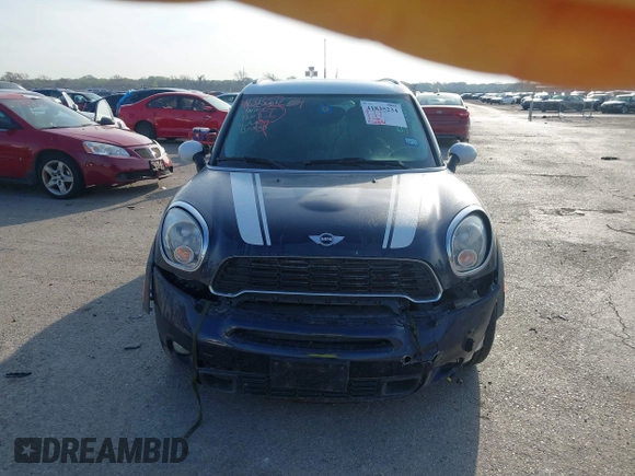 2013 MINI Countryman S ALL4 with VIN WMWZC5C58DWP33707, listed as a IAAI auction lot 41835234 with 98,441 mi miles and . Bid and sale history available at DreamBid. Image 12.