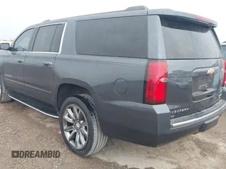 2020 Chevrolet Suburban Premier with VIN 1GNSCJKC8LR290783, listed as a IAAI auction lot 42636126 with 59,371 mi miles and . Bid and sale history available at DreamBid. Image 3.