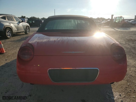 2005 Ford Thunderbird Deluxe with VIN 1FAHP60AX5Y106268, listed as a Copart auction lot 74180834 with 49,157 mi miles and Salvage Title. Bid and sale history available at carsss.com. Image 6.