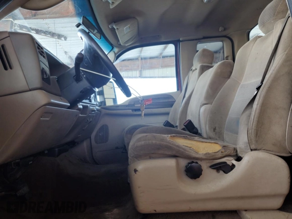 2004 Ford F-250 XL with VIN 1FTNX20L34EA06312, listed as a Copart auction lot 53779295 with 315,600 mi miles and Salvage title. Bid and sale history available at DreamBid. Image 7.