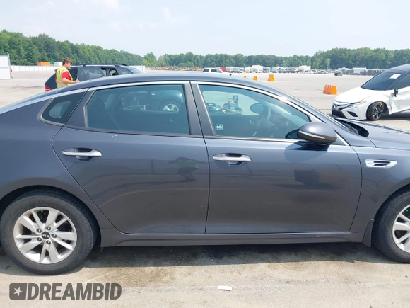 2016 Kia Optima LX with VIN KNAGT4L33G5111199, listed as a IAAI auction lot 42380970 with 97,072 mi miles and . Bid and sale history available at DreamBid. Image 13.