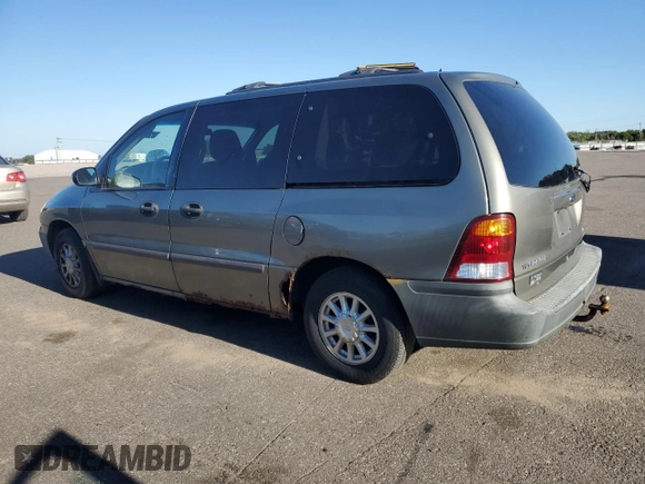 2001 Ford Windstar LX z VIN 2FMZA51441BA35669, wystawiony jako Copart lot #73283214 z przebiegiem 240 538 mil mil oraz Szkody całkowita. Historia ofert i sprzedaży dostępna na DreamBid. Obrazek 2.