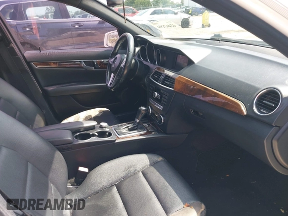 2014 Mercedes-Benz C 250 Sport with VIN WDDGF4HB2EA963886, listed as a IAAI auction lot 42463194 with 139,926 mi miles and . Bid and sale history available at DreamBid. Image 5.
