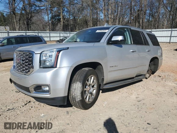 2018 GMC Yukon Denali with VIN 1GKS1CKJ0JR241040, listed as a Copart auction lot 47592655 with 133,737 mi miles and Salvage Title. Bid and sale history available at carsss.com. Image 1.
