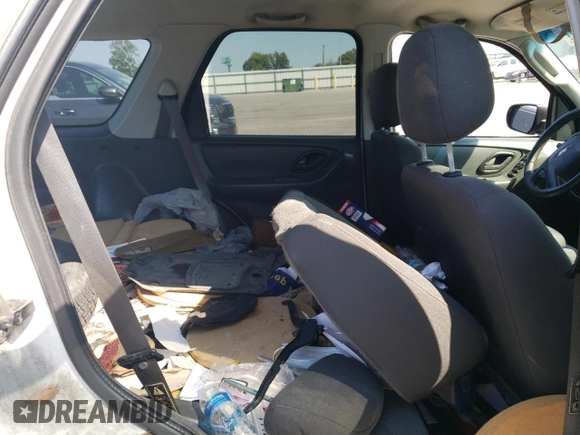 2004 Ford Escape XLS with VIN 1FMYU021X4DA07352, listed as a Copart auction lot 68909864 with 275,776 mi miles and Salvage Title. Bid and sale history available at DreamBid. Image 11.