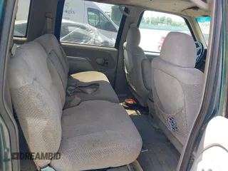 1995 GMC Suburban with VIN 1GKEC16KXSJ712111, listed as a IAAI auction lot 42185423 with 269,010 mi miles and . Bid and sale history available at DreamBid. Image 8.