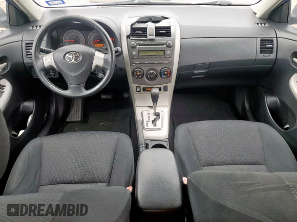 2010 Toyota Corolla with VIN 2T1BU4EE5AC498504, listed as a Copart auction lot 57043515 with 128,651 mi miles and Salvage title. Bid and sale history available at DreamBid. Image 8.