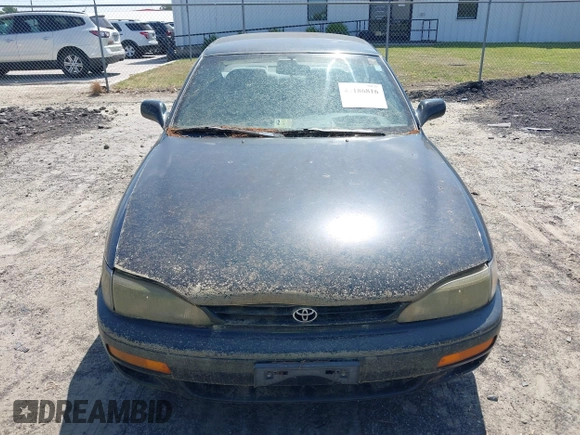 1995 Toyota Camry LE z VIN 4T1SK12E3SU576500, wystawiony jako IAAI lot #42186816 z przebiegiem 216 809 mil mil oraz . Historia ofert i sprzedaży dostępna na DreamBid. Obrazek 6.