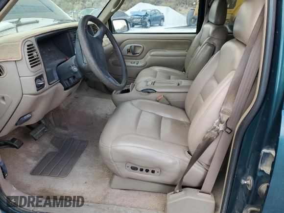 1996 GMC Yukon with VIN 1GKEK13R6TJ747606, listed as a Copart auction lot 80763434 with 308,837 mi miles and Salvage Title. Bid and sale history available at DreamBid. Image 7.
