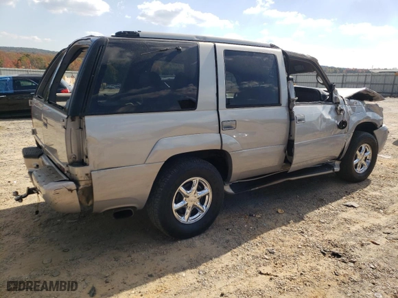 2000 GMC Denali with VIN 1GKEK13R2YR138523, listed as a Copart auction lot 77609804 with 203,514 mi miles and Salvage Title. Bid and sale history available at carsss.com. Image 3.
