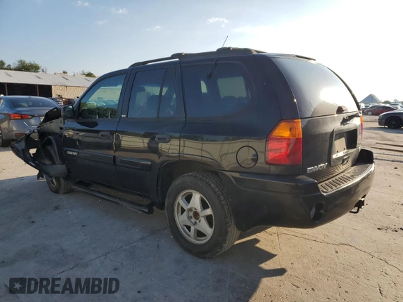 2003 GMC Envoy SLE with VIN 1GKDS13S232329083, listed as a Copart auction lot 73147534 with 212,645 mi miles and Salvage Title. Bid and sale history available at DreamBid. Image 2.
