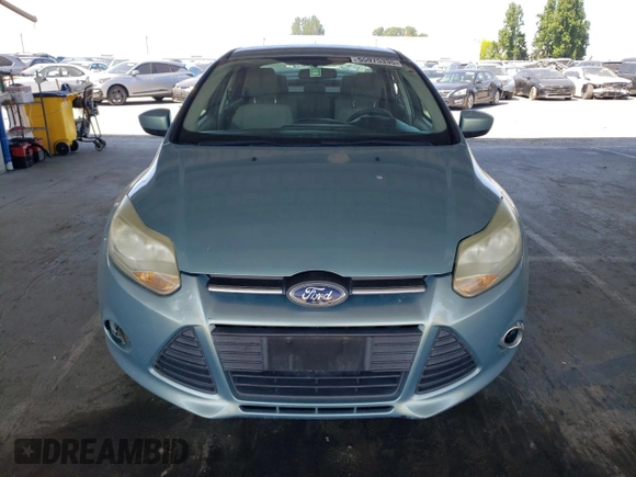 2012 Ford Focus SE with VIN 1FAHP3F23CL263018, listed as a Copart auction lot 55975335 with 167,823 mi miles and Salvage title. Bid and sale history available at DreamBid. Image 5.