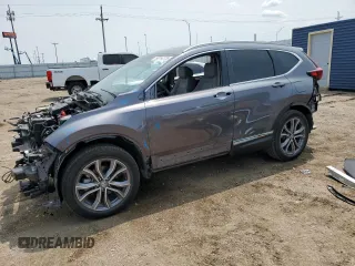 2021 Honda CR-V Touring z VIN 2HKRW2H90MH623017, wystawiony jako Copart lot #59014275 z przebiegiem Nie podano mil oraz Szkoda całkowita • Salvage title. Historia ofert i sprzedaży dostępna na DreamBid. Obrazek 1.