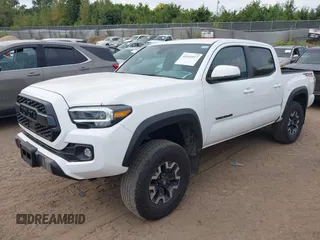 2023 Toyota Tacoma SR z VIN 3TMCZ5AN1PM637609, wystawiony jako IAAI lot #40345917 z przebiegiem 12 614 mil mil oraz . Historia ofert i sprzedaży dostępna na DreamBid. Obrazek 22.