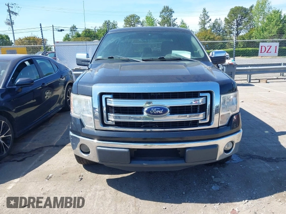 2014 Ford F-150 XL with VIN 1FTFW1CF5EKD93147, listed as a IAAI auction lot 42069973 with 277,140 mi miles. Bid and sale history available at carsss.com. Image 6.