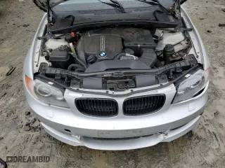 2011 BMW 1 Series 135i with VIN WBAUC9C56BVM09045, listed as a Copart auction lot 73316874 with 125,679 mi miles and Salvage Title. Bid and sale history available at carsss.com. Image 11.